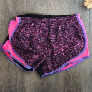 Black, pink, and purple Nike Tempo Shorts